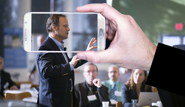 Business-professionals-collaborating-with-video-screens,-showing-comprehensive-business-growth
