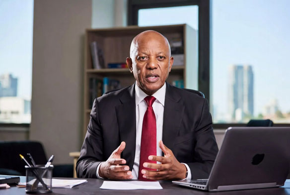 Corporate leader delivering a video message in a Johannesburg office.
