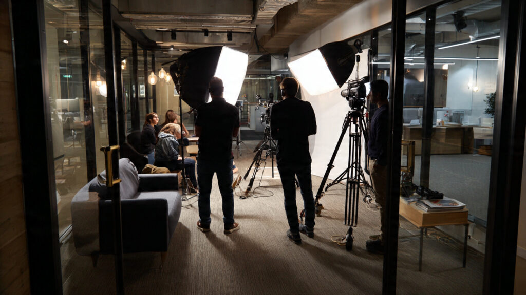 affordable video production team filming with small crew setup